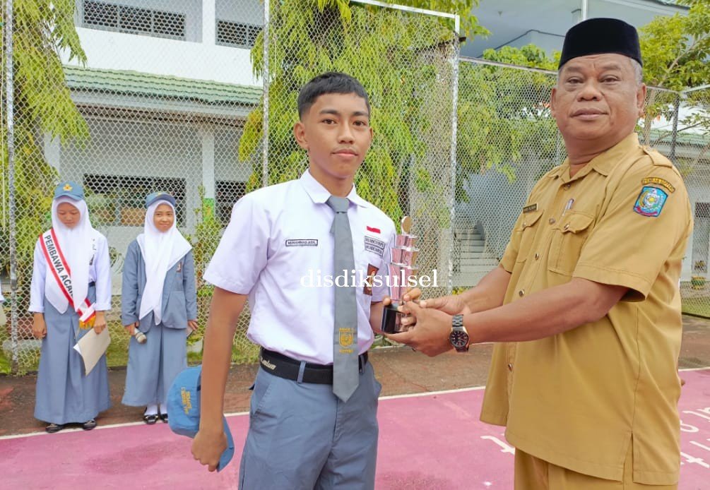 Muhammad Aidil Raih Juara 2 Kategori Beregu dalam Tarkam Bulutangkis yang Diselenggarakan Disparpora